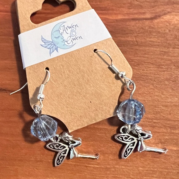 Blue Faux Crystal Earrings With Silver Fairy Charm - Picture 2 of 2